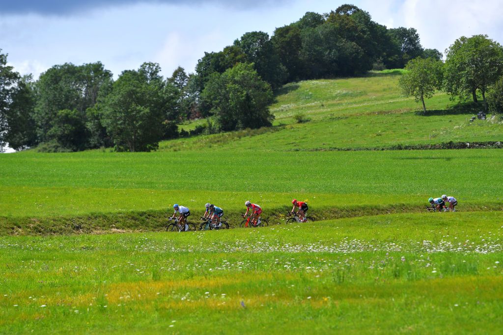 LLEX MONTSJURA FRANCE JULY 31 Dmitrii Strakhov of Russia and Team Gazprom Rusvelo Alan Boileau of France and Team BB Hotels PB KTM Victor Lafay of France and Team Cofidis Thibault Guernalec of France and Team Arka Samsic in the Breakaway during the 33rd Tour de lAin 2021 Stage 3 a 125km stage from Izernore to Llex MontsJura 900m tourdelain on July 31 2021 in Llex MontsJura France Photo by Luc ClaessenGetty Images