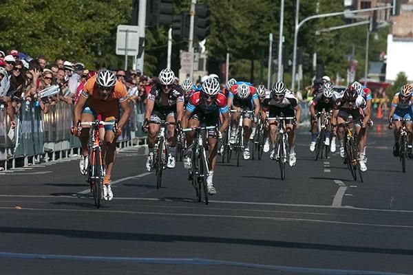 Ben Grenda (left) of Tasmania charges to victory in the mens' under 23 national criterium championship in Ballarat.