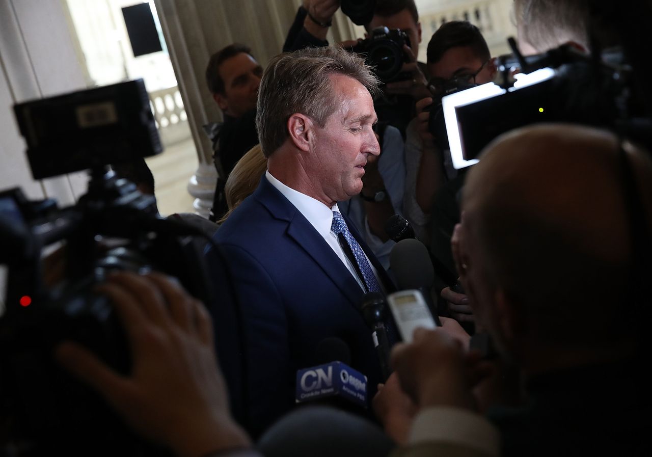 Sen. Jeff Flake speaks to reporters