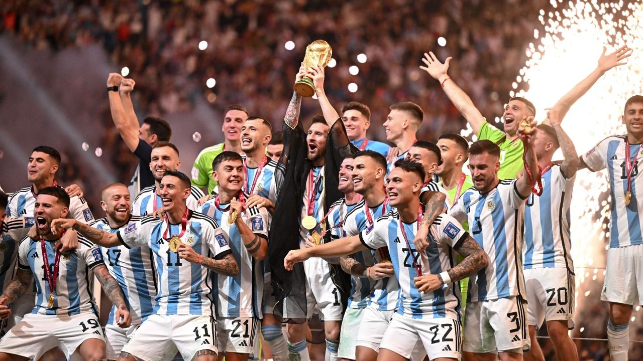 Argentina captain Lionel Messi lifts the Fifa World Cup 