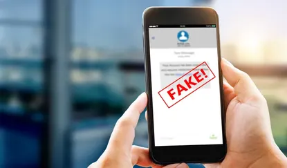 A toll road scam text on a smartphone