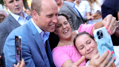 Prince William, Prince of Wales poses for selfies with members of the public as he visits Pret A Manger on September 07, 2023 in Bournemouth, England