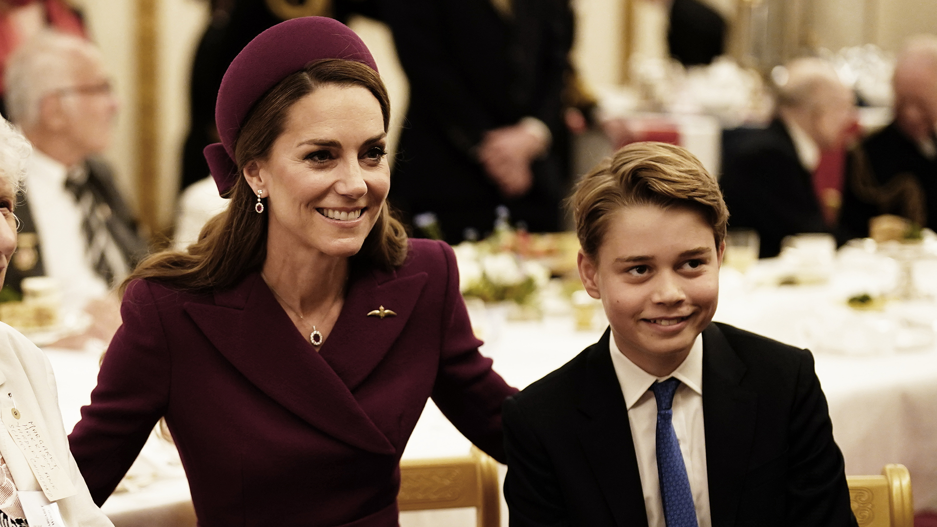 LONDON, ENGLAND - MAY 5: Catherine, Princess of Wales and Prince George join Second World War veterans at a tea party in Buckingham Palace following the military procession to mark the 80th anniversary of VE Day on May 5, 2025 in London, England. The King and Queen, joined by Members of the Royal Family, will take part in events from May 5th to May 8th to commemorate the 80th Anniversary of VE Day, which signalled the end of the Second World War in Europe. (Photo by Jordan Pettitt - WPA Pool/Getty Images)