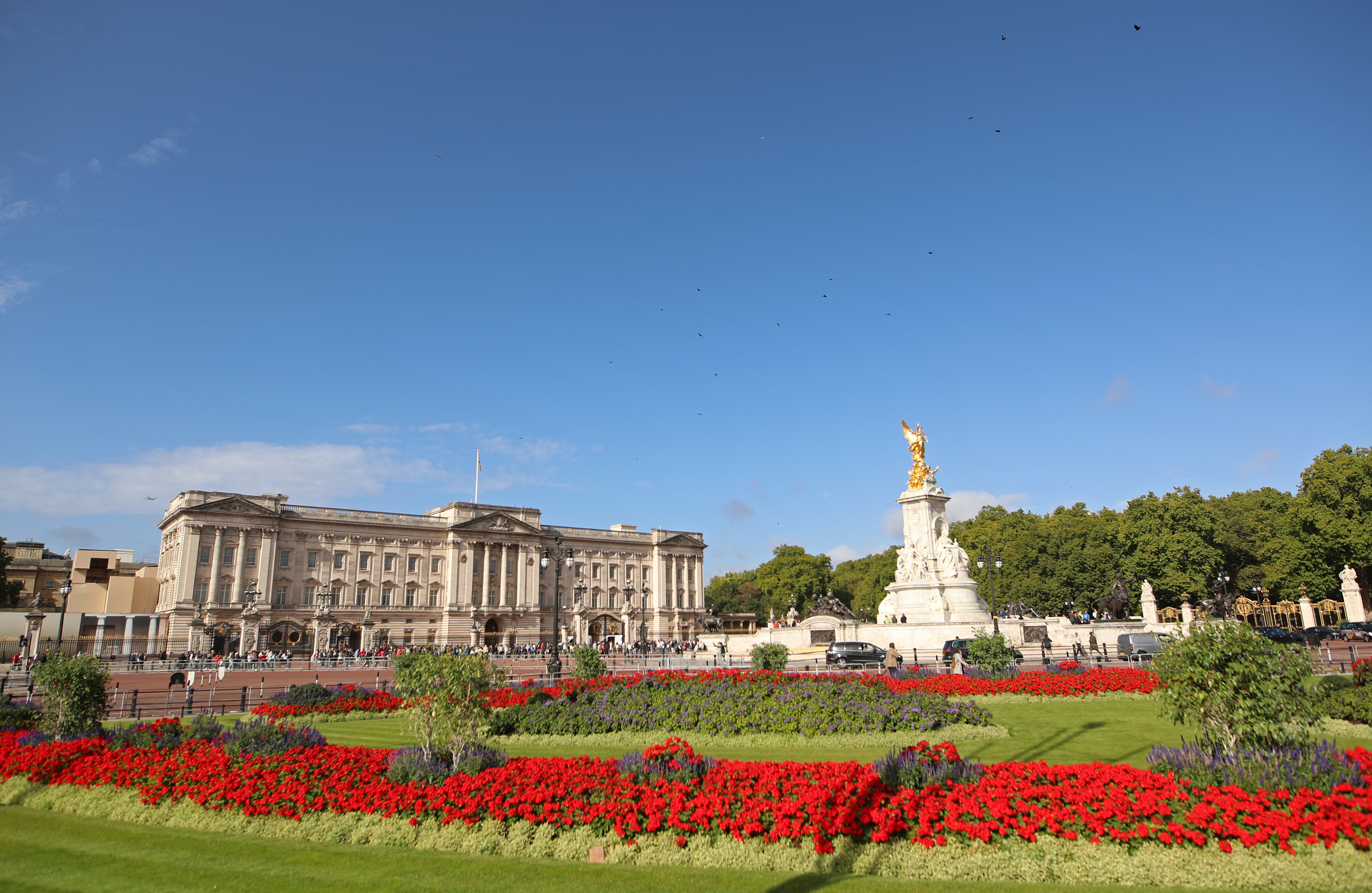 Buckingham Palace exterior with flowers