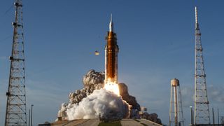 The Artemis II crewed lunar mission lifts off from Pad 39B at Kennedy Space Center in Cape Canaveral, Florida, on April 1, 2026. Four astronauts blasted off aboard a massive NASA rocket April 1 on a long-anticipated journey around the Moon, the first crewed lunar flyby in more than 50 years. With an intense roar that reverberated far beyond the launchpad, the enormous orange-and-white rocket carried three Americans and one Canadian away from Florida's Kennedy Space Center at approximately 6:35 pm local time, according to an AFP journalist onsite. "We're going to the Moon!" yelled a spectator. (Photo by Jim WATSON / AFP via Getty Images)
