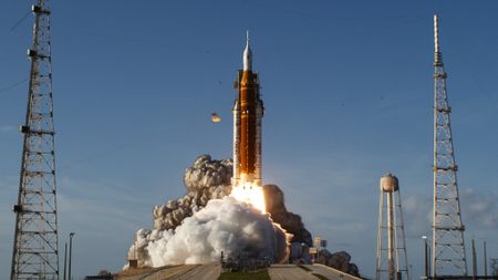 The Artemis II crewed lunar mission lifts off from Pad 39B at Kennedy Space Center in Cape Canaveral, Florida, on April 1, 2026. Four astronauts blasted off aboard a massive NASA rocket April 1 on a long-anticipated journey around the Moon, the first crewed lunar flyby in more than 50 years. With an intense roar that reverberated far beyond the launchpad, the enormous orange-and-white rocket carried three Americans and one Canadian away from Florida's Kennedy Space Center at approximately 6:35 pm local time, according to an AFP journalist onsite. "We're going to the Moon!" yelled a spectator. (Photo by Jim WATSON / AFP via Getty Images)