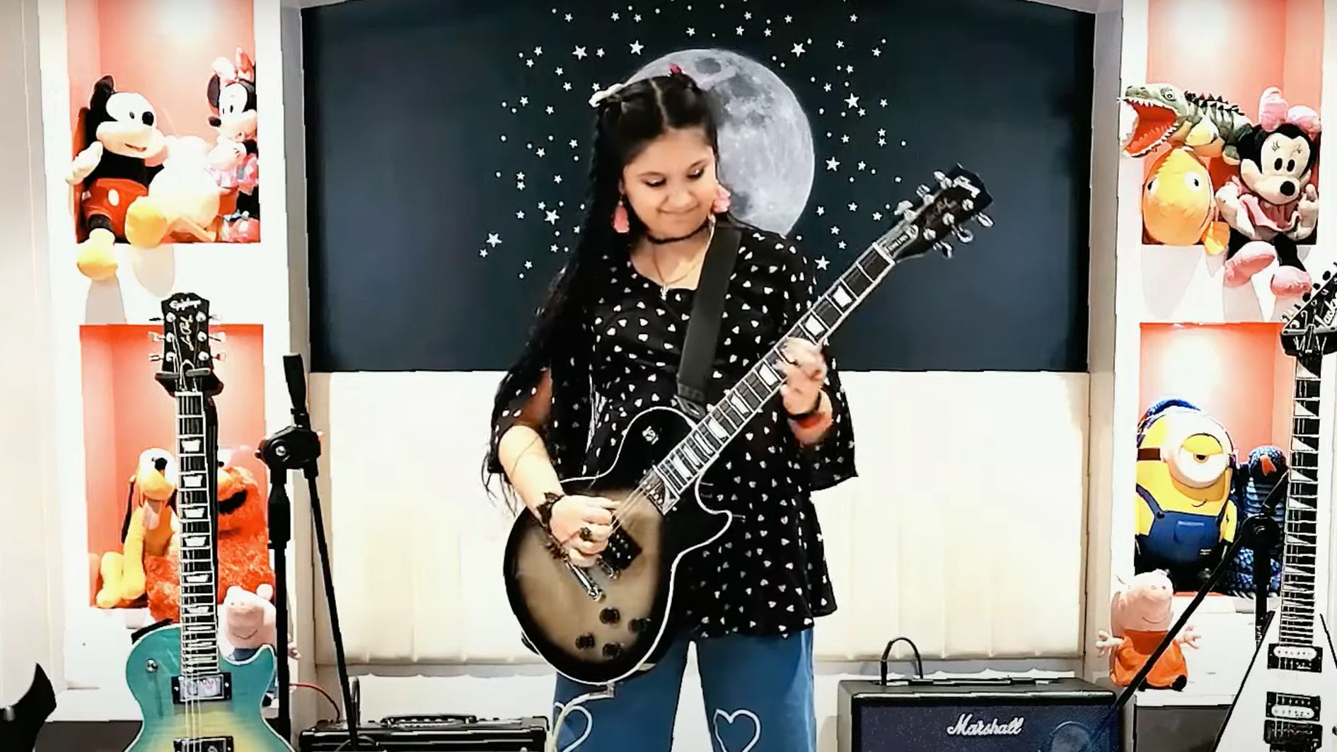 9yearold Maya Neelakantan plays Tool medley on Adam Jones guitar