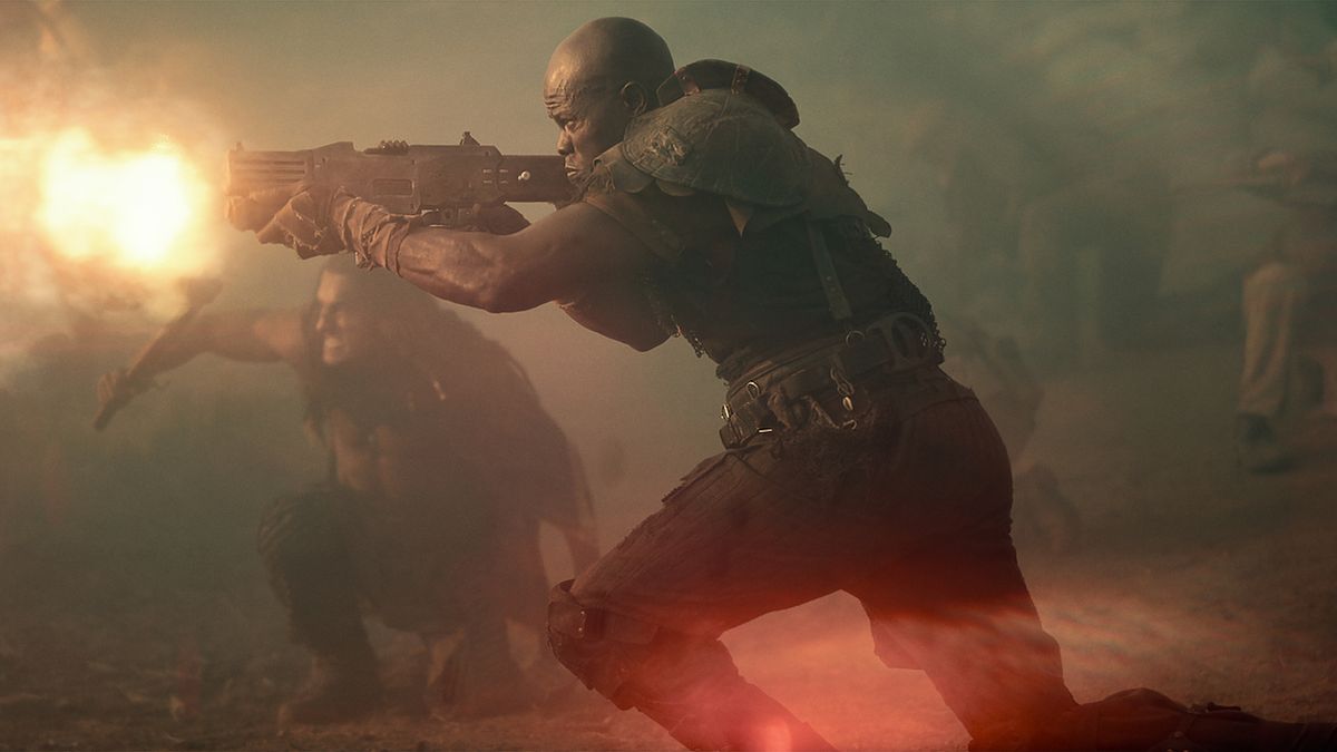 Djimon Hounsou&#039;s Titus firing rifle in Rebel Moon: Part Two