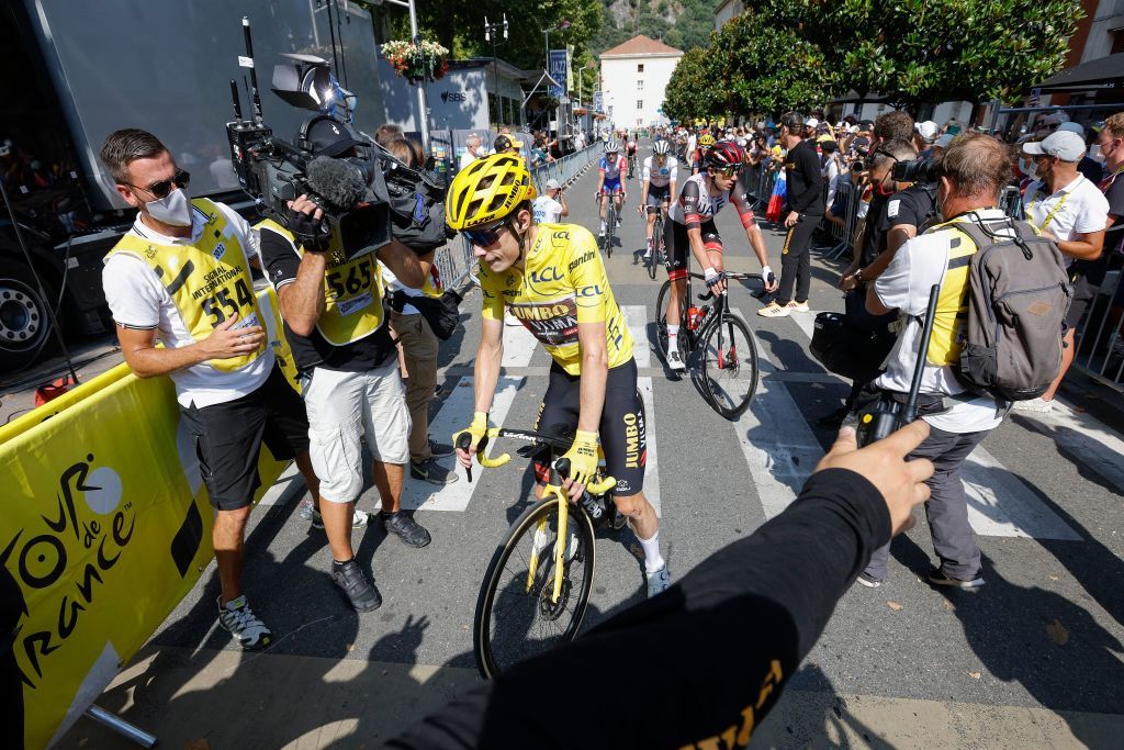 JumboVisma teams Danish rider Jonas Vingegaard C wearing the overall leaders yellow jersey reacts after completing the 16th stage of the 109th edition of the Tour de France cycling race 1785 km between Carcassonne and Foix in southern France on July 19 2022 Photo by GONZALO FUENTES POOL AFP Photo by GONZALO FUENTESPOOLAFP via Getty Images