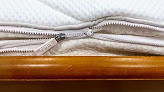 The zip to attach the flippable layer on the Koala Calm As mattress