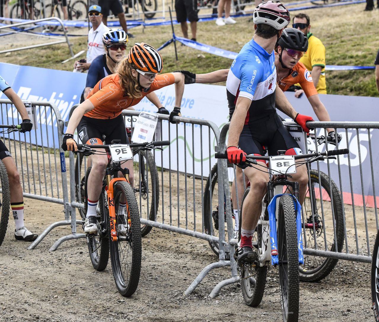 Anne Terpstra (Netherlands) hands off to the last rider