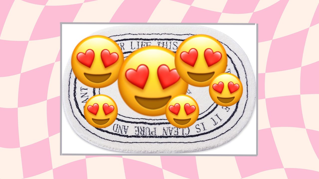 White bath mat on pink checkered background with heart eyes emoji hiding the bath mat