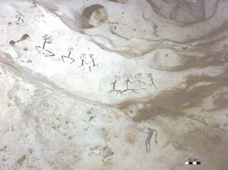 These human figures date to at least 13,600 years ago. It's possible they drawn at the height of the last Glacial Maximum, about 20,000 years ago.