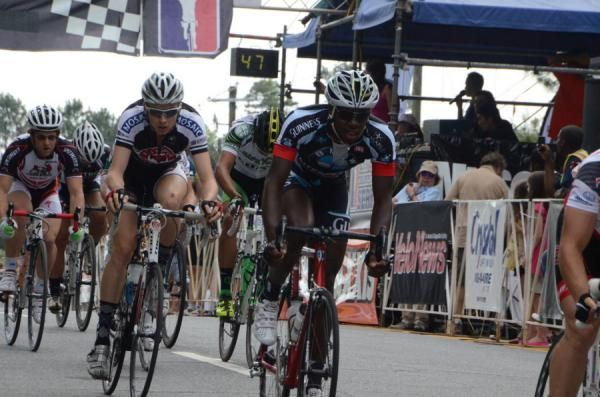 ONeil Samuels (BMW-Litepseed) sits in the pack.