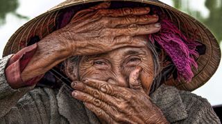 Portrait of old woman by Rehahn, from his Hidden Smiles series