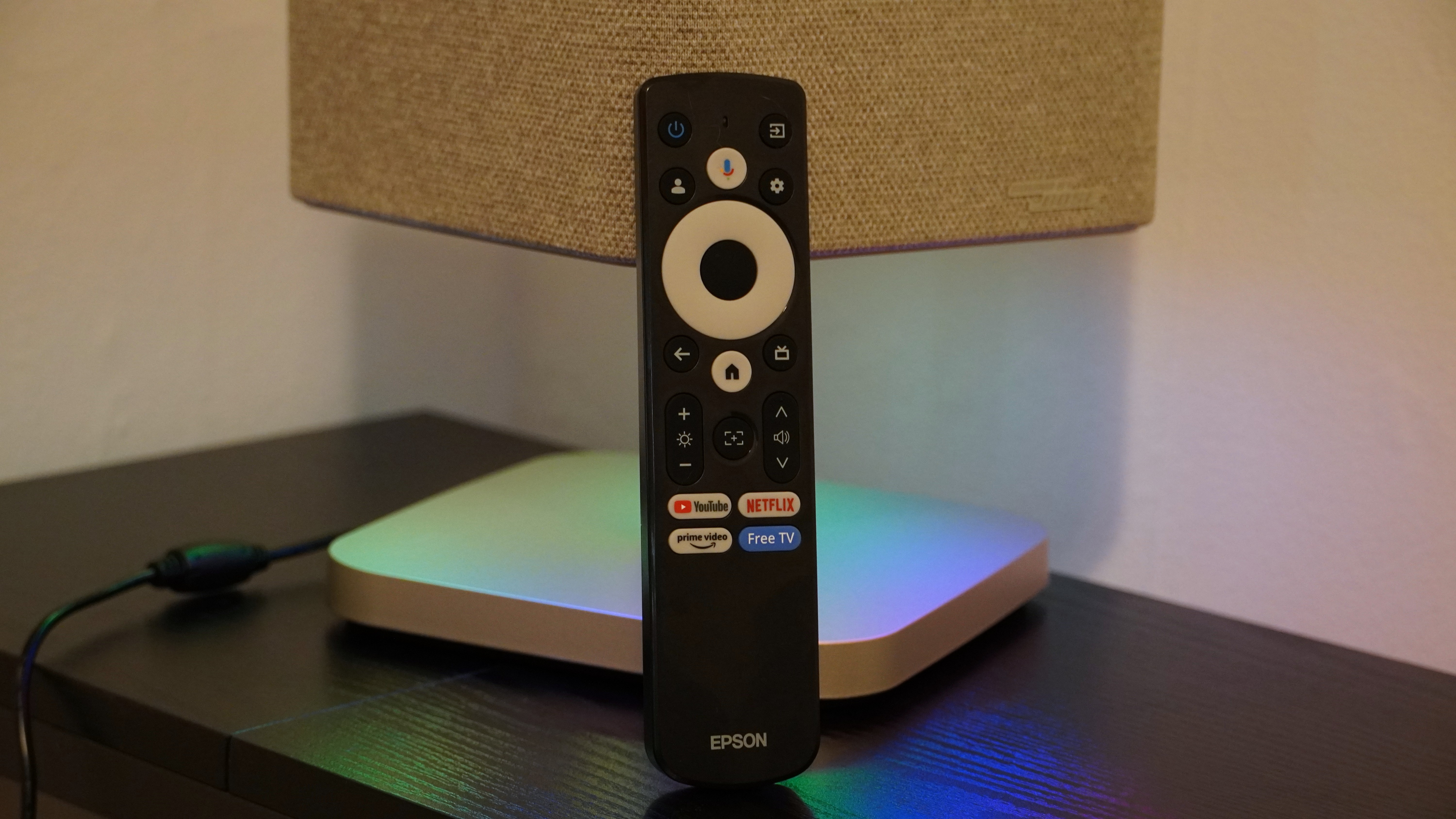 Epson Lifestudio Flex Plus with remote control on table