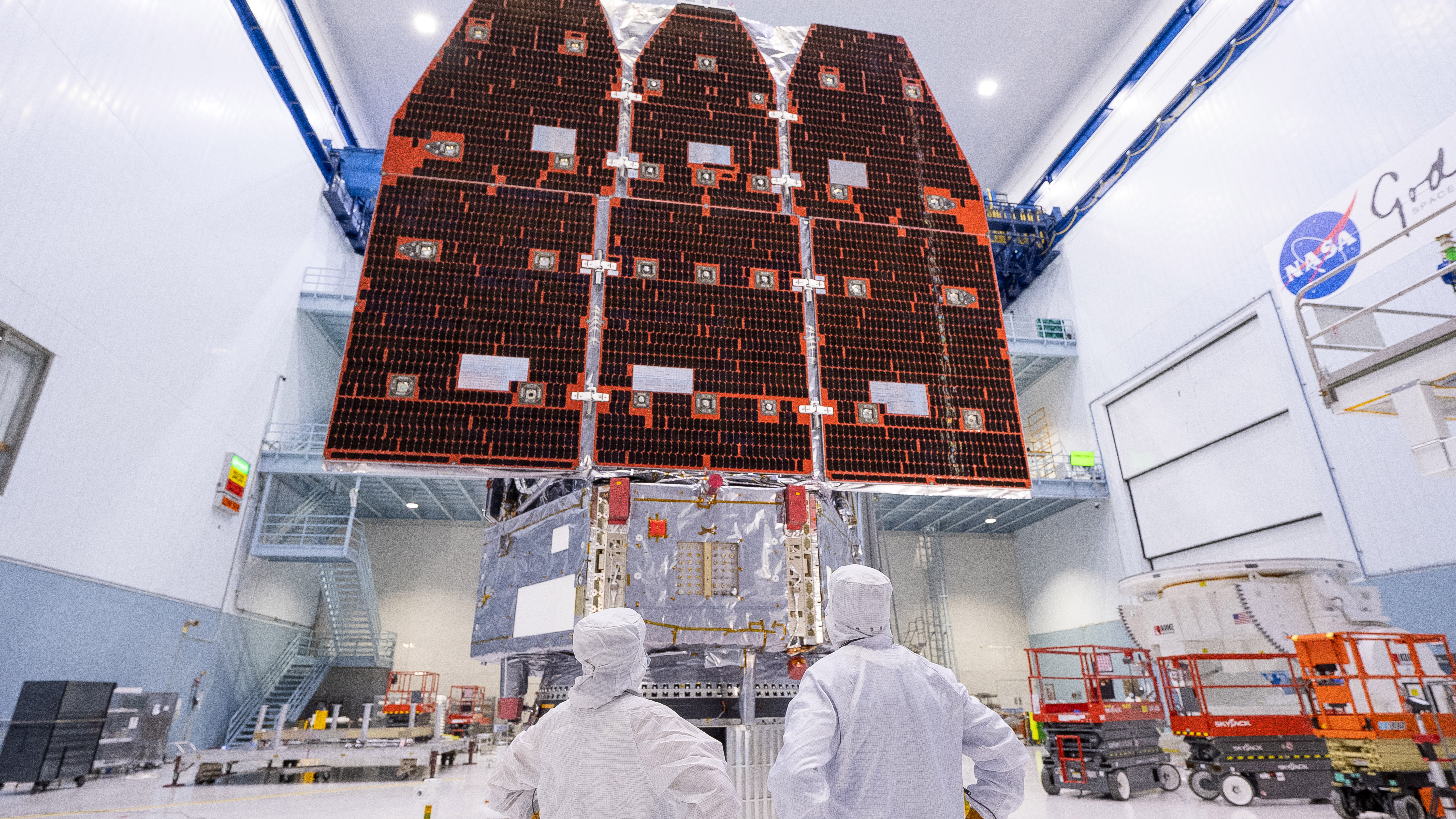 Workers finish assembling the Nancy Grace Roman Space Telescope in a clean room