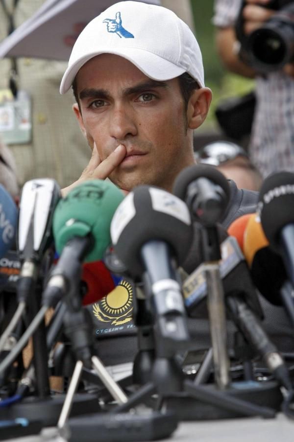 Former Tour de France winner Alberto Contador didn't look overly thrilled as he waited for a press conference to start.