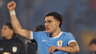 MONTEVIDEO, URUGUAY - JUNE 10: Manuel Ugarte and José María Giménez of Uruguay celebrate the victory after the FIFA World Cup 2026 South American Qualifier match between Uruguay and Venezuela at Estadio Centenario on June 10, 2025 in Montevideo, Uruguay. (Photo by Ernesto Ryan/Getty Images)