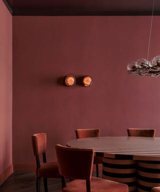 Red dining room with eggplant ceiling