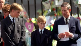 The Prince of Wales with Prince William and Prince Harry outside Westminster Abbey at the funeral of Diana, The Princess of Wales on September 6, 1997.