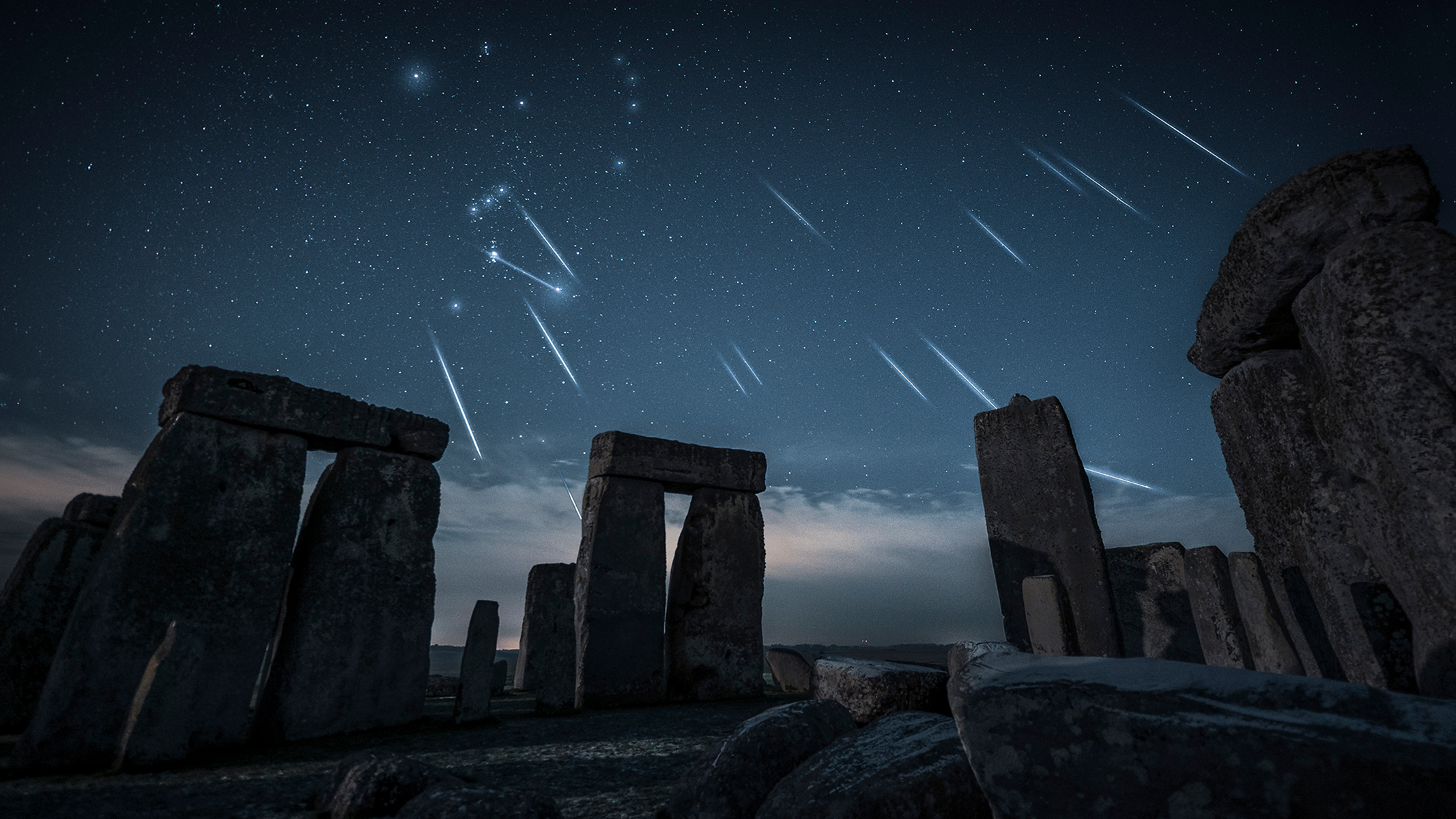 Stonehenge with The Geminids Meteor above