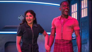 Belinda Chandra (Varada Sethu) and the Doctor (Ncuti Gatwa) standing outside the TARDIS.