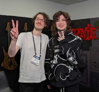 GuitarWorld.com Editor-in-Chief Michael Astley-Brown with Polyphia guitarist Tim Henson