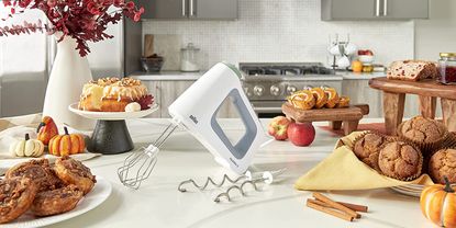 Image of Braun lifestyle image of mixer surrounded by baked goods in kitchen