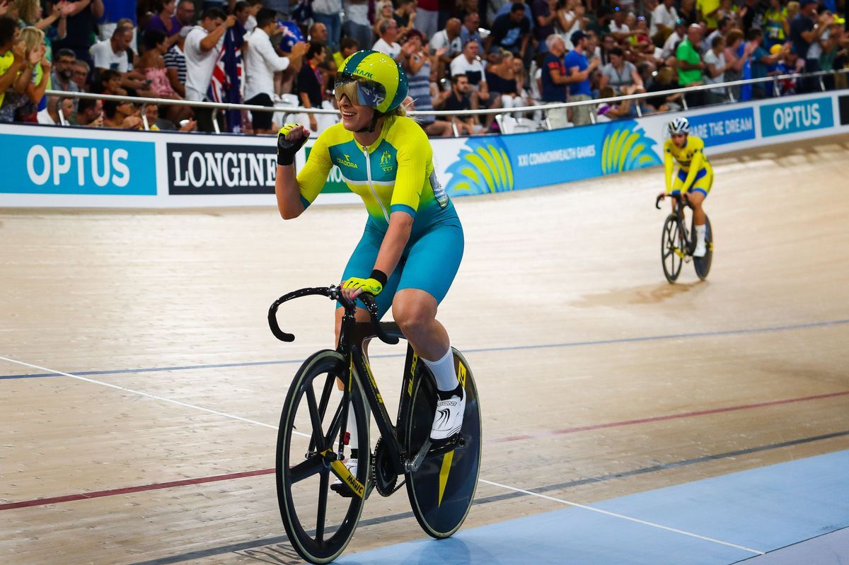 Annette Edmondson (Australia) celebrates the win of Amy Cure in the scratch race
