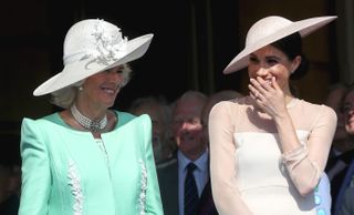 Camilla and Meghan at the Prince of Wales' 70th birthday in 2018