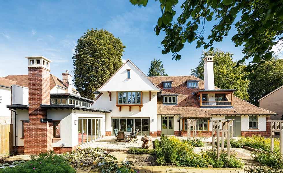 arts and crafts style self build with dormer windows