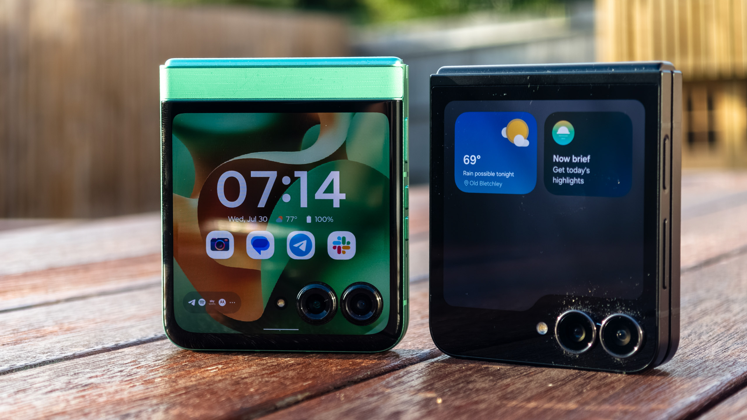 Samsung Galaxy Z Flip 7 FE in Black vs Razr 2025 on a table