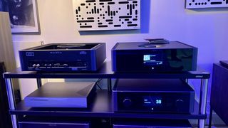 Rotel's Michi Q5 Transport DAC o a hi-fi rack, in a listening facility