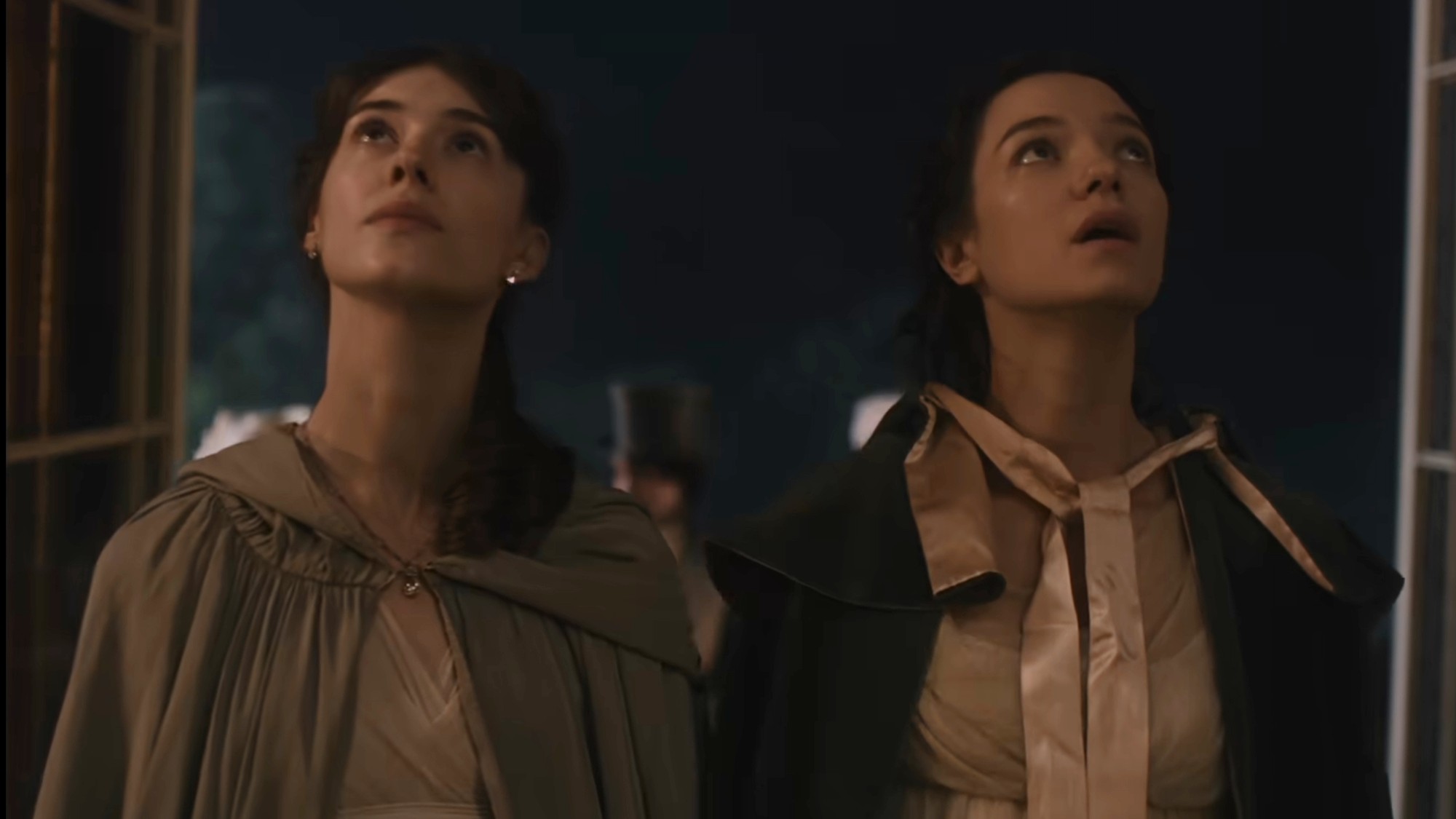 Daisy Edgar Jones and Esme Creed Miles looking up in Sense and Sensibility.