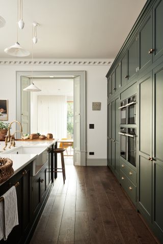 how to choose kitchen flooring dark hardwood green kitchen cabinets by devol