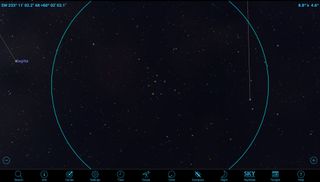 The Coat Hanger is an asterism, a picture made from a grouping of stars. Some asterisms, like the Big Dipper, are large and bright, and use only part of a constellation. Other asterisms are smaller, combining small groups of fainter stars, making these formations ideal binocular targets. The Coat Hanger lies midway between the bright stars of Altair and Vega, overhead in the October evening sky. The blue circle represents the field of view in standard, 10 x 50 binoculars.