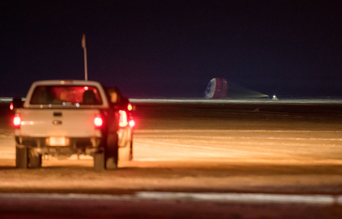 The Boeing CST-100 Starliner spacecraft lands in White Sands, New Mexico, Sunday, Dec. 22, 2019. The landing completes an abbreviated Orbital Flight Test for the company that still meets several mission objectives for NASA&rsquo;s Commercial Crew program.