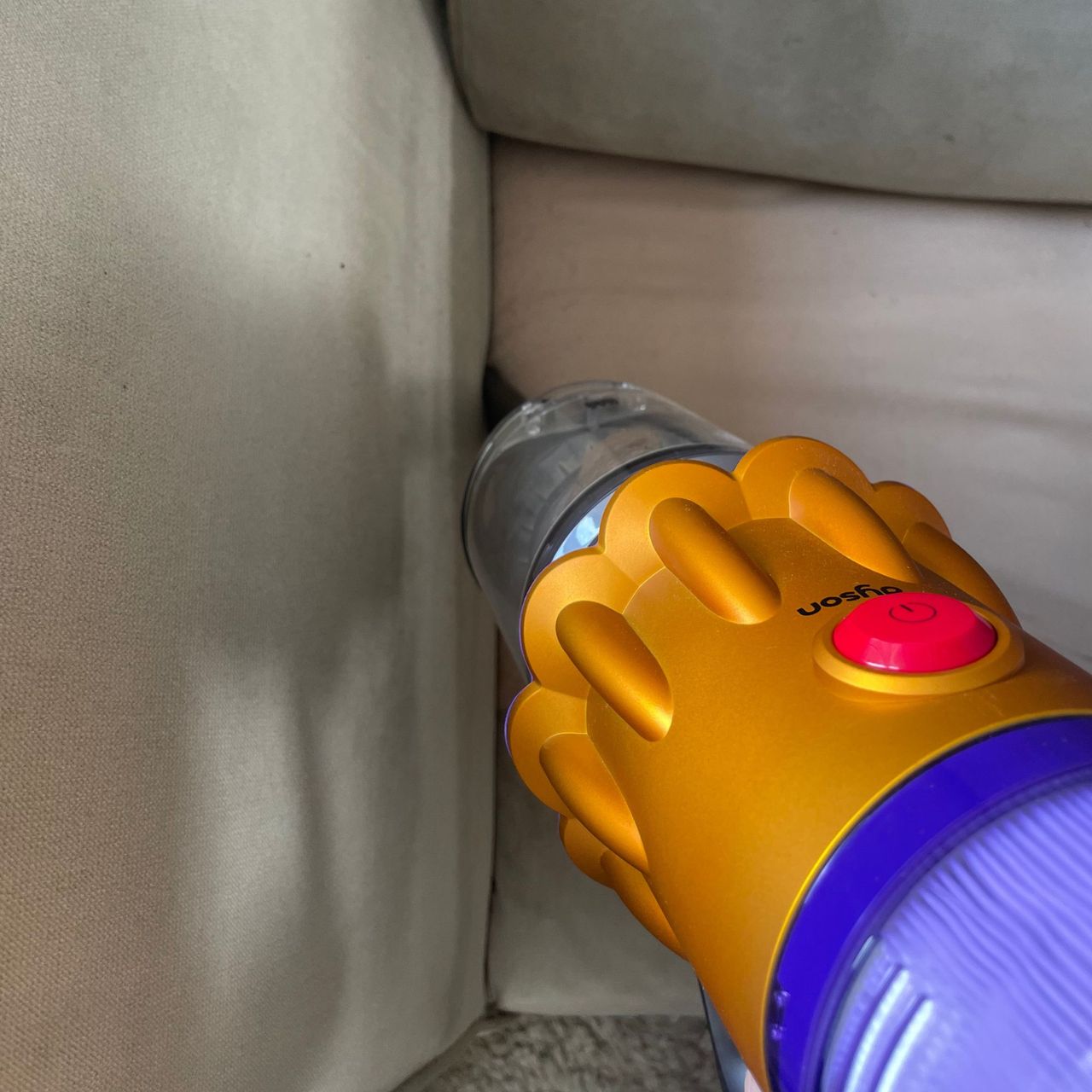 Using the Dyson crevice tool down a sofa