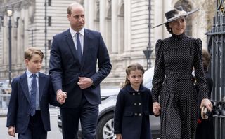 Prince William, Duke of Cambridge and Prince George of Cambridge with Catherine, Duchess of Cambridge and Princess Charlotte of Cambridge attend a memorial service