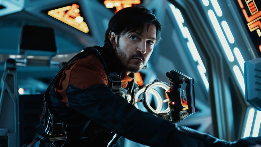 Cassian looking at someone off-camera from a TIE fighter cockpit in Andor season 2