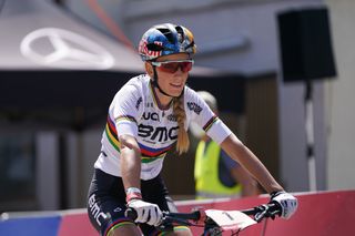 Image shows Pauline Ferrand-Prévot cycling.