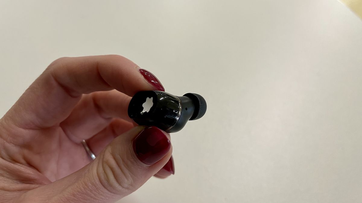 Montblanc MTB 03 earbud held in a hand