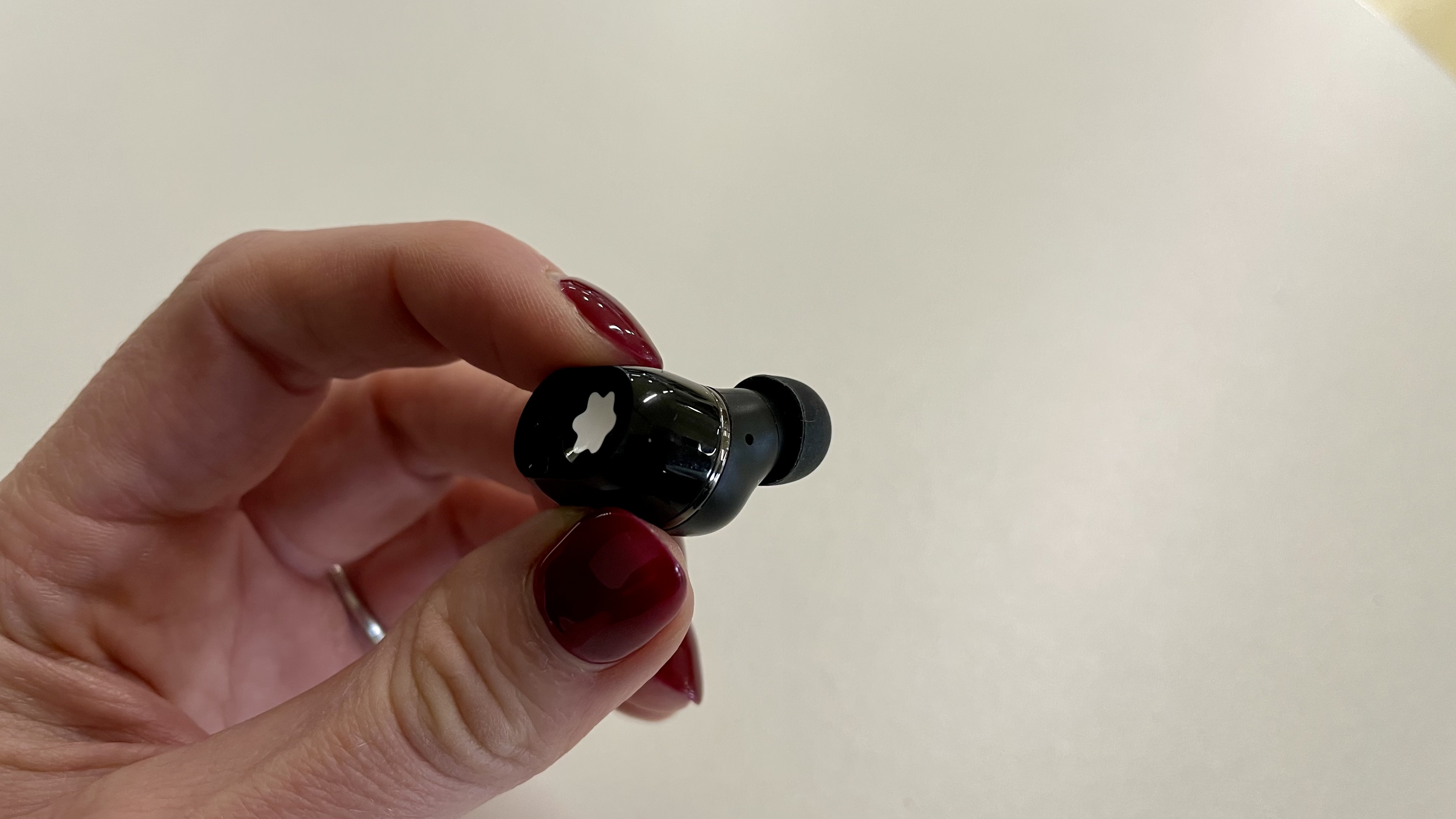 Montblanc MTB 03 earbud held in a hand