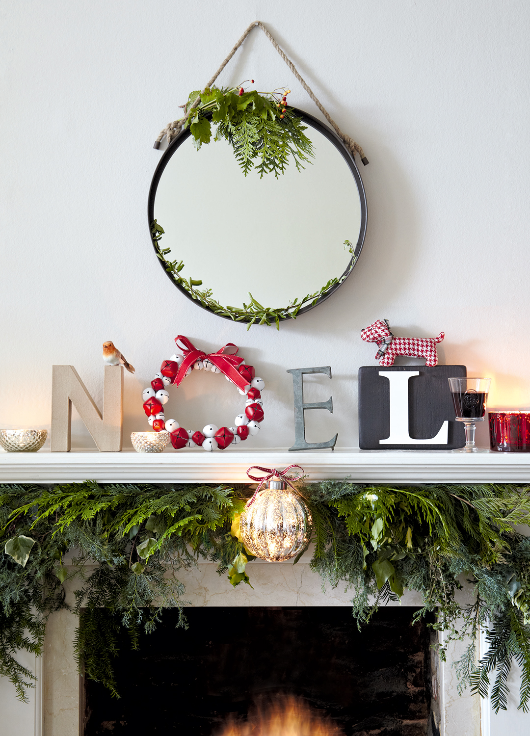 Noel letters on a mantlepiece styled for Christmas