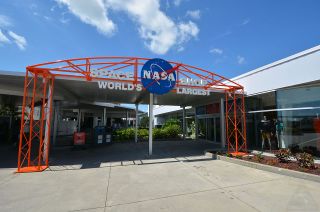 The entranceway leading into the "world's largest space shop” at NASA’s Kennedy Space Center Visitor Complex in Florida is modeled after the Apollo 11 gantry arm located inside.