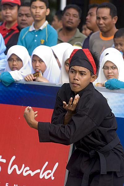 A local performer at the startline in Mersing prior to stage four of the tour.