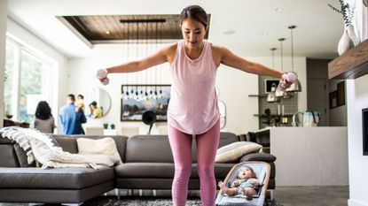 Woman doing an arm workout at home