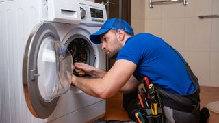 Professional repairing washing machine