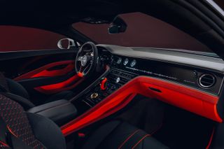 Inside front of Bentley Mulliner Batur with black and red trim